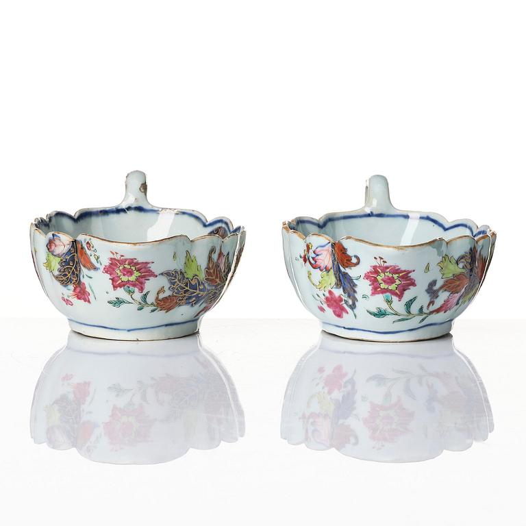 A pair of famille rose pseudo tobacco leaf sauce boats, Qing dynasty, Qianlong (1736-95).