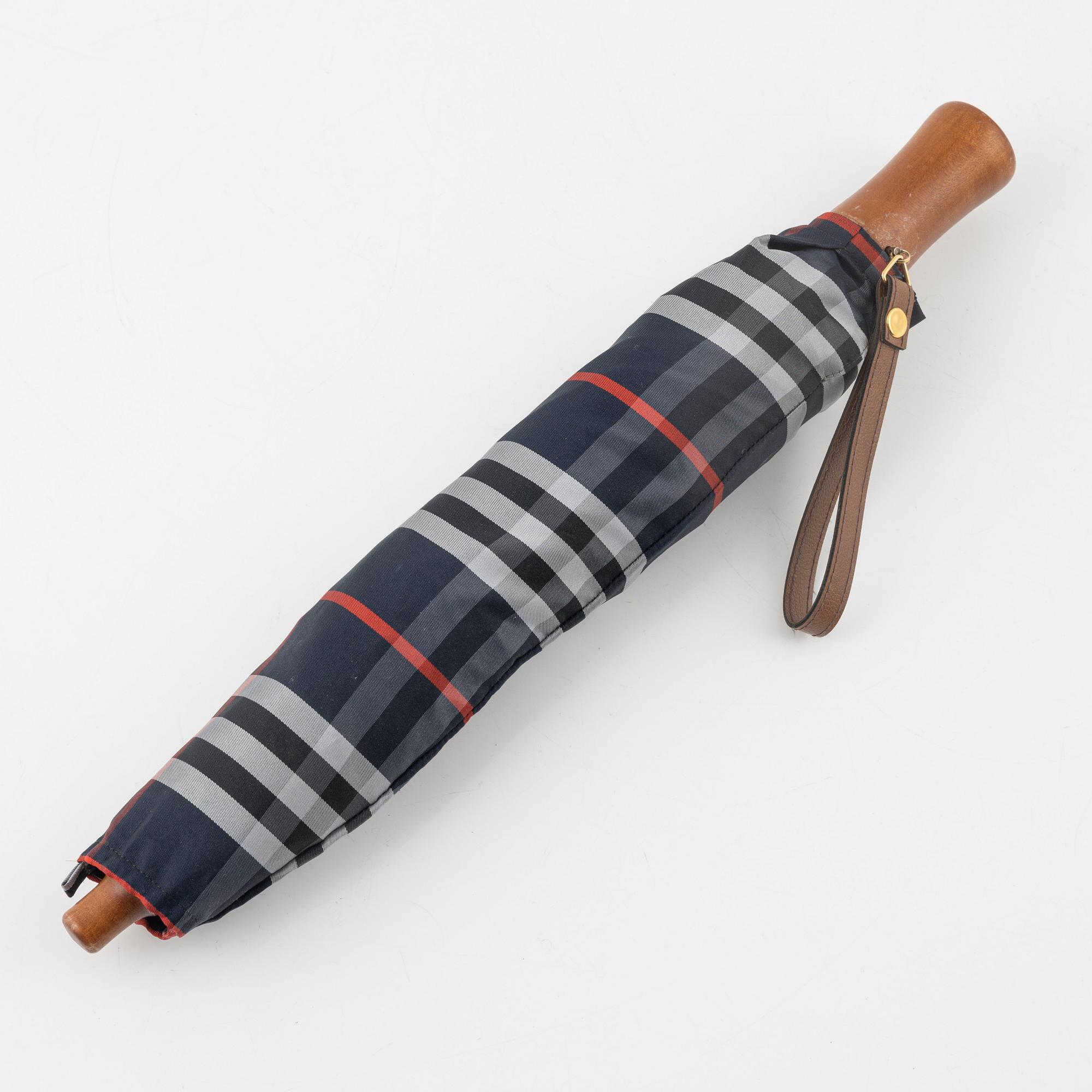Burberry umbrella. Bukowskis