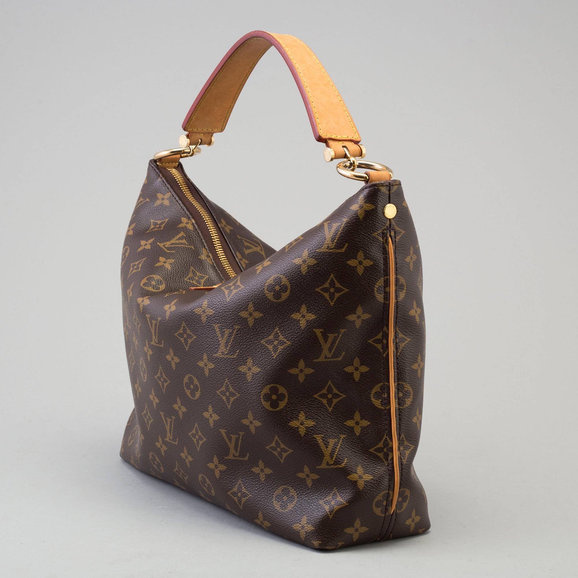 a LOUIS VUITTON 'Sully PM' bag.