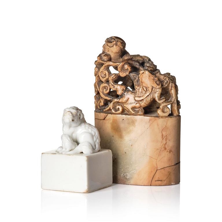Two seal stamps, soapstone and blanc de chine. Qing dynasty 18th/19th century.