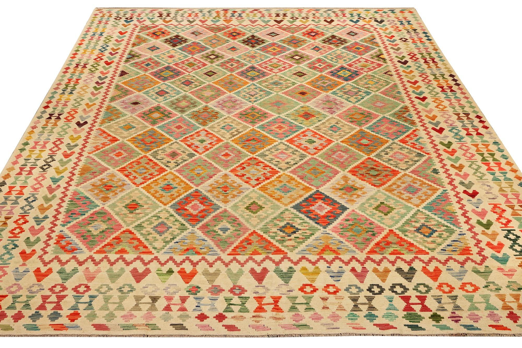 A Kilim carpet, c. 390 x 306 cm.