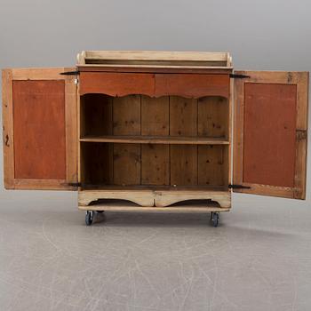 A 19th century cabinet.