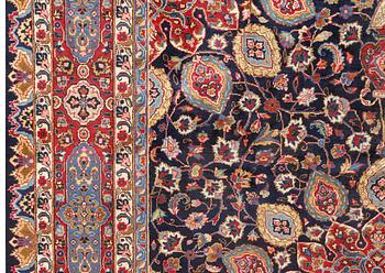 A Kashmar carpet from eastern Iran of 'Ardabil' design, signed, c 338 x 245 cm.