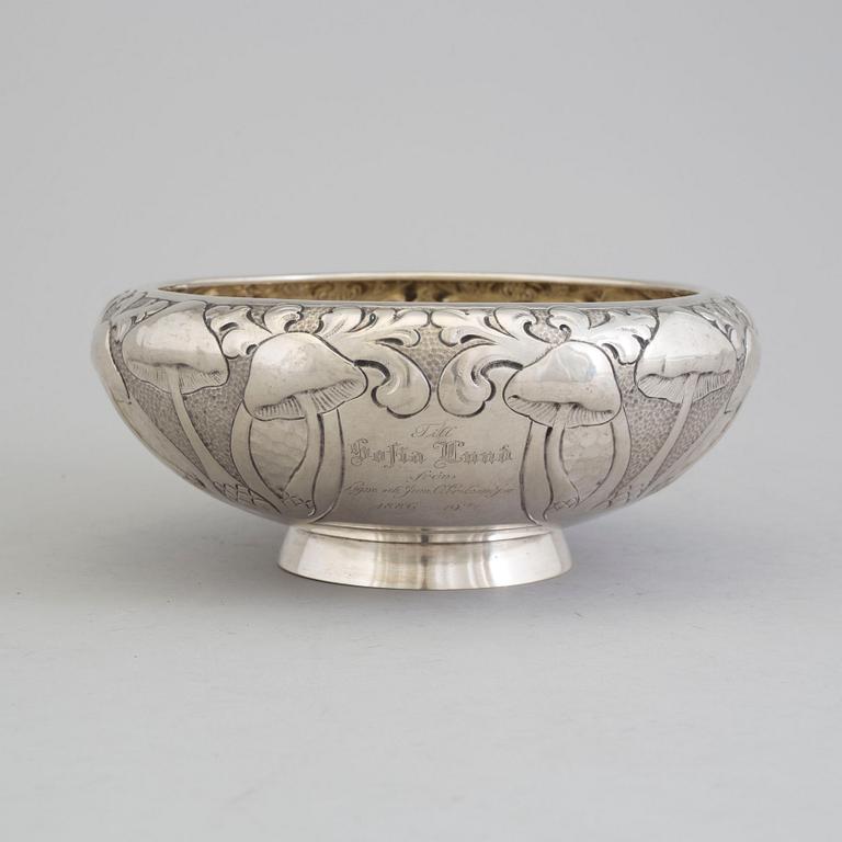 A Norwegian Art Nouveau parcel-gilt bowl decorated with mushrooms maker's mark J Tostrup, Oslo, 1907.