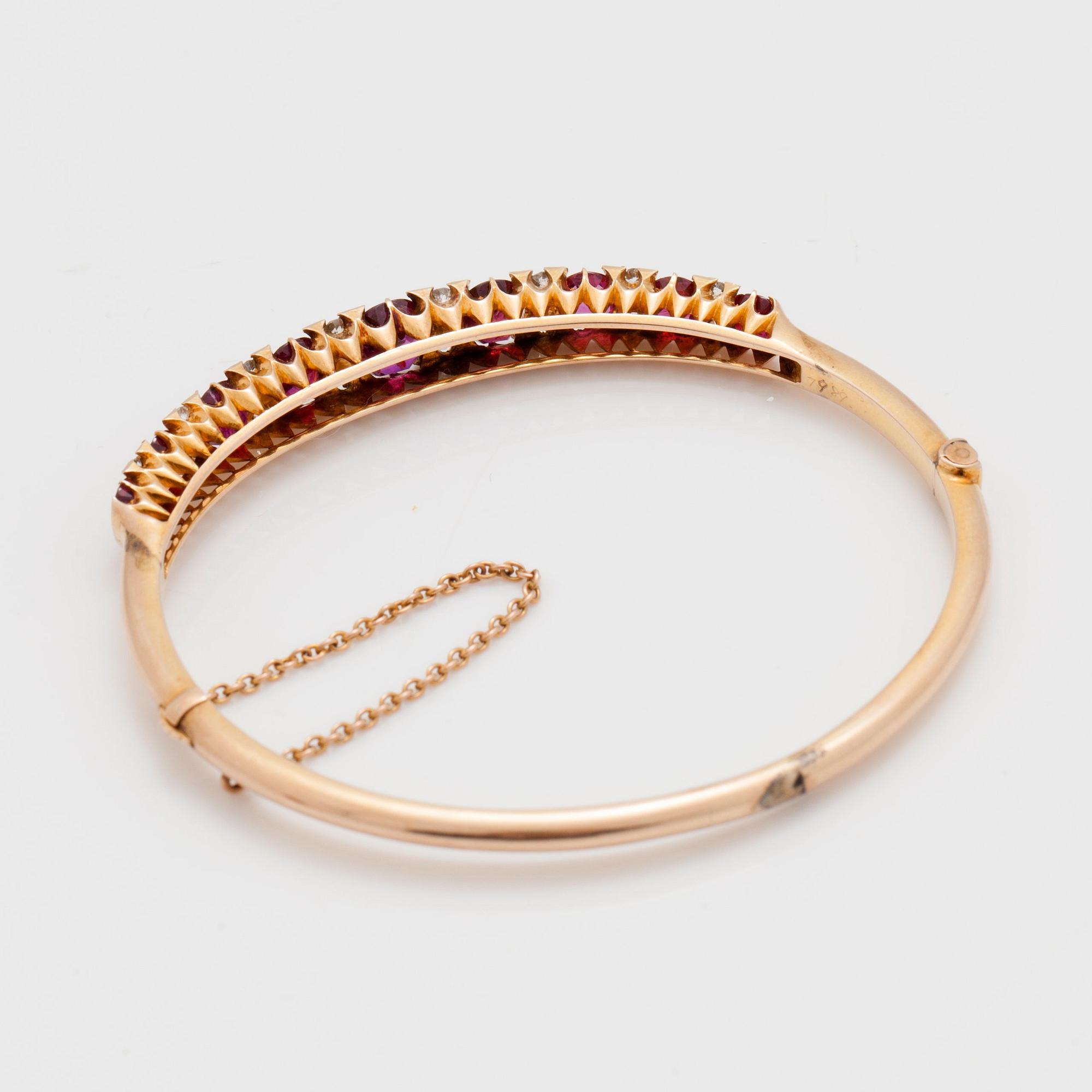 An old cut diamond and ruby bracelet. Total carat weight of diamonds circa 0.30 ct.