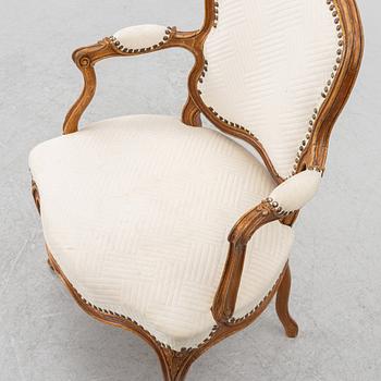 A French Louis XV oåpen back armchair, mid 18th century.