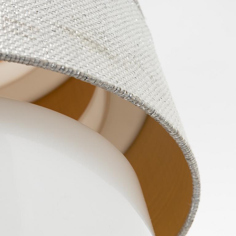 An acrylic 'Cylindrus Arkitektura' table light, Luxus, Vittsjö.