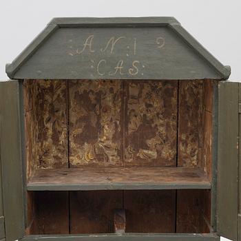A painted cabinet, about 1800.