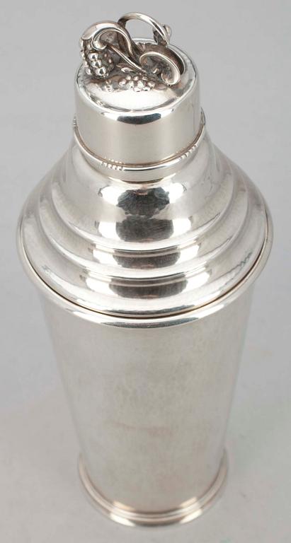 A COCKTAIL SHAKER.