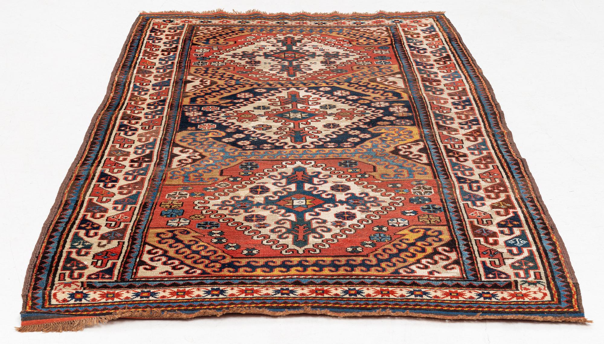 An antique Borchalou Kazak rug, south Caucasus, c. 227 x 137 cm.