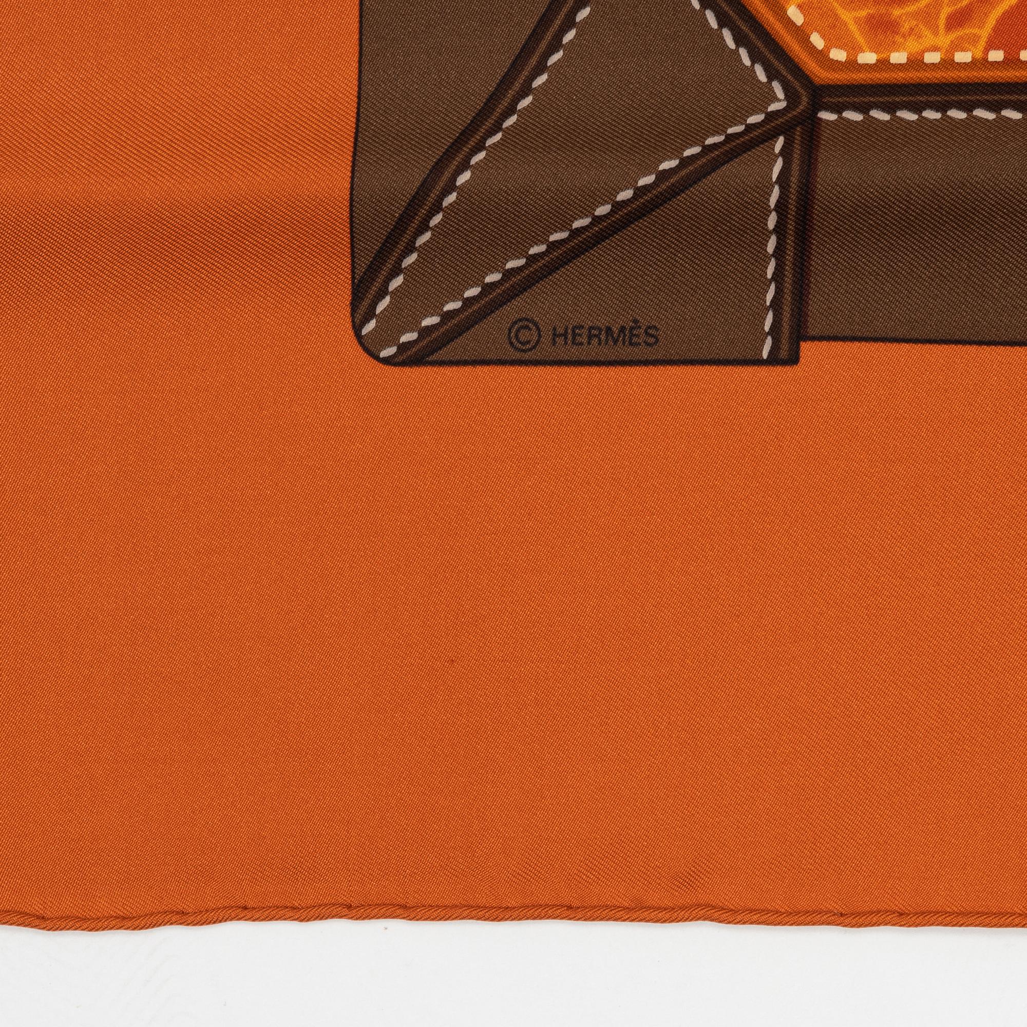 Hermès, a 'Tout cuir' silk scarf.