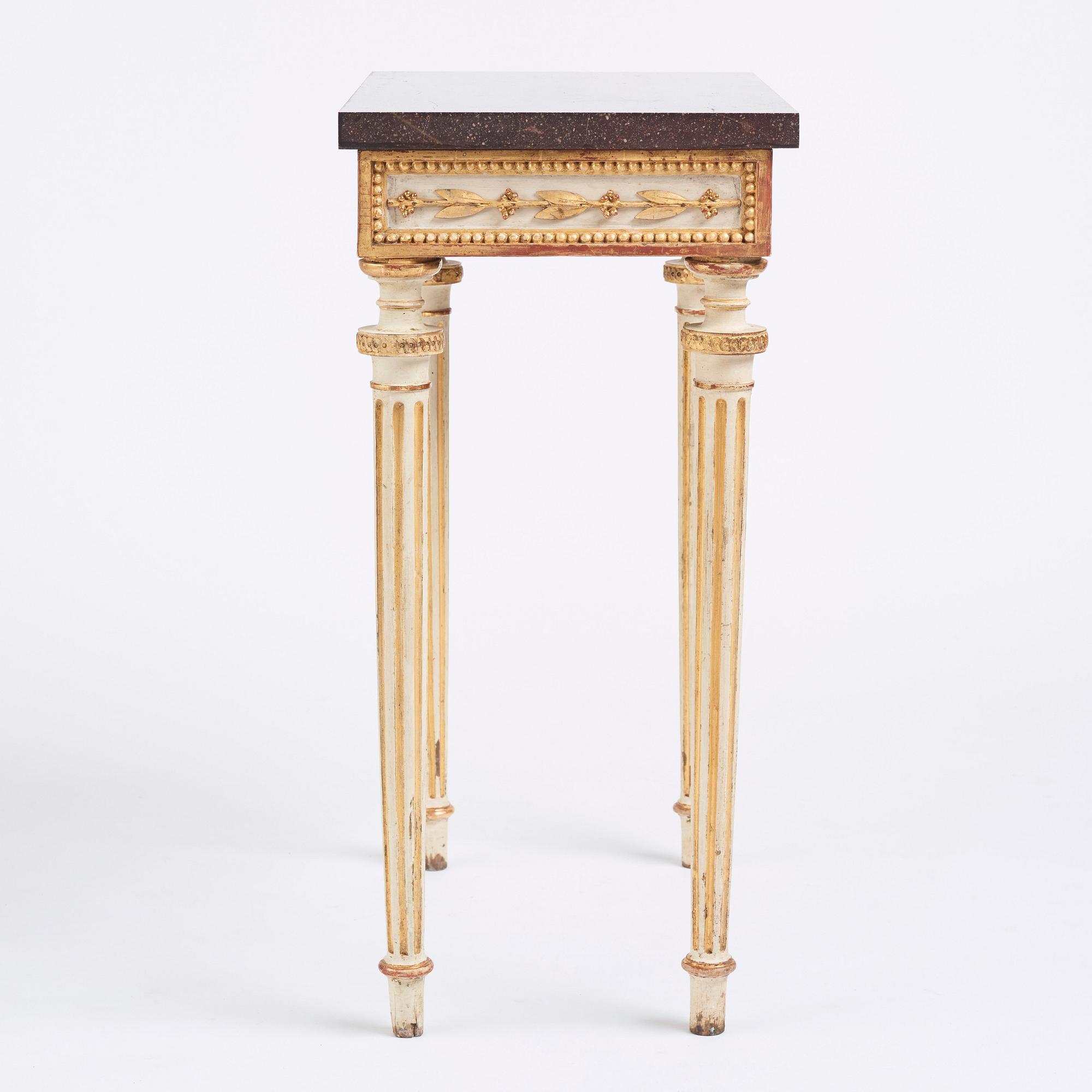 A late Gustavian console table in the manner of P Ljung, late 18th century. Stone top in porphyry.