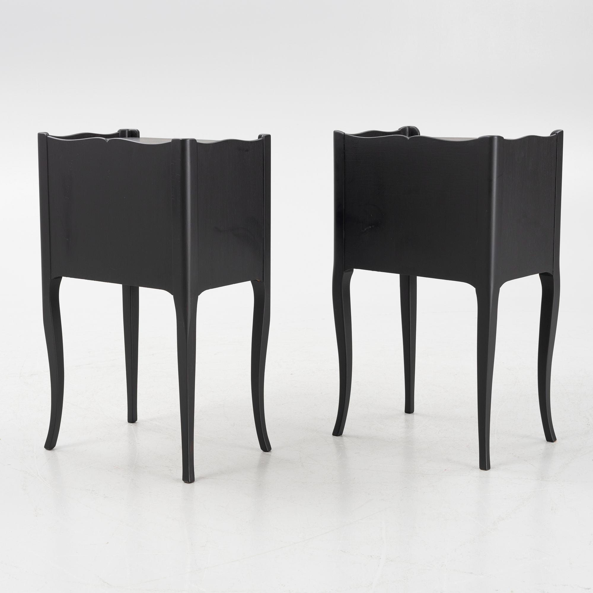 A pair of Rococo style bedside tables, second half of the 20th Century.