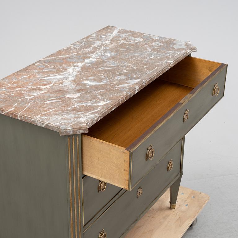 A late gustavian style chest of drawers, first half of the 20th Century.