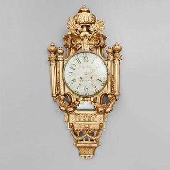 A Gustavian wall clock by Claes Berg, master 1762.