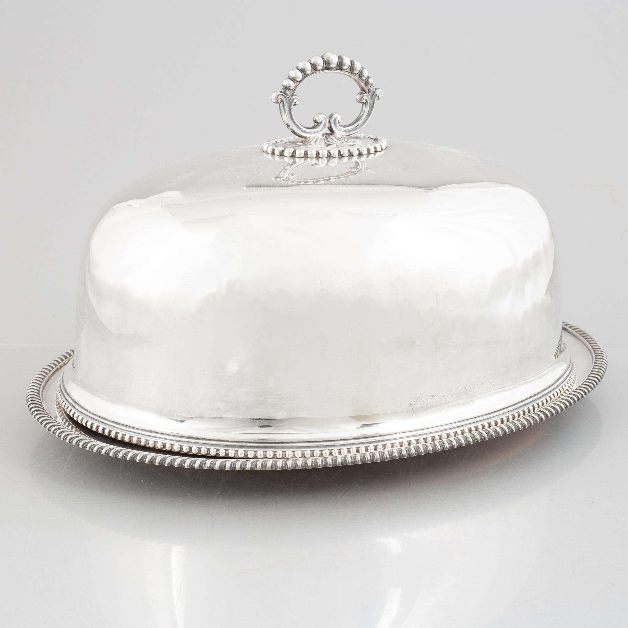 A silver plate food dome cover, Atkin Brothers, Sheffield, England, and a dish, circa 1900.