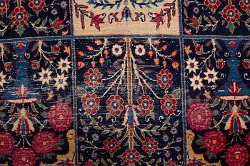 A carpet, an antique/a semi-antique Yezd, ca 557-562 x 366,5-370,5 cm.