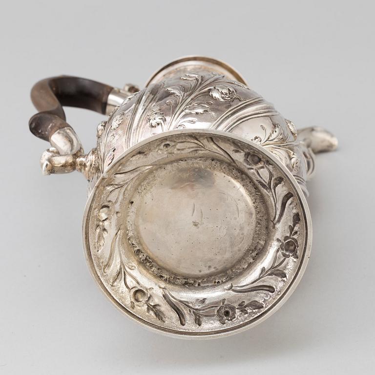 An English 18 th century silver coffee-pot, mark of Benjamin Gignac, London 1763.