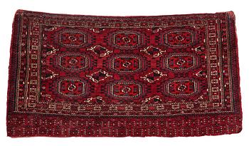 323. A rug/a bag, an antique Tekke chuval, Turkmen, ca  80-85 x 146-157 cm.