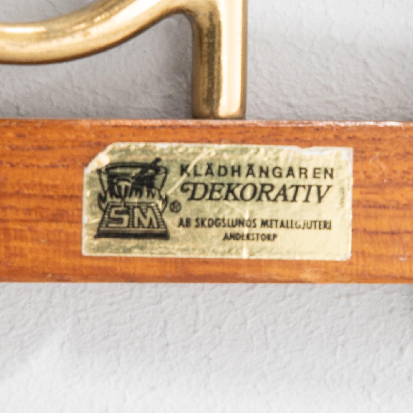 Clothes hangers, three "Decorative" Skoglund's Metal Foundry Anderstorp 1950s/60s.