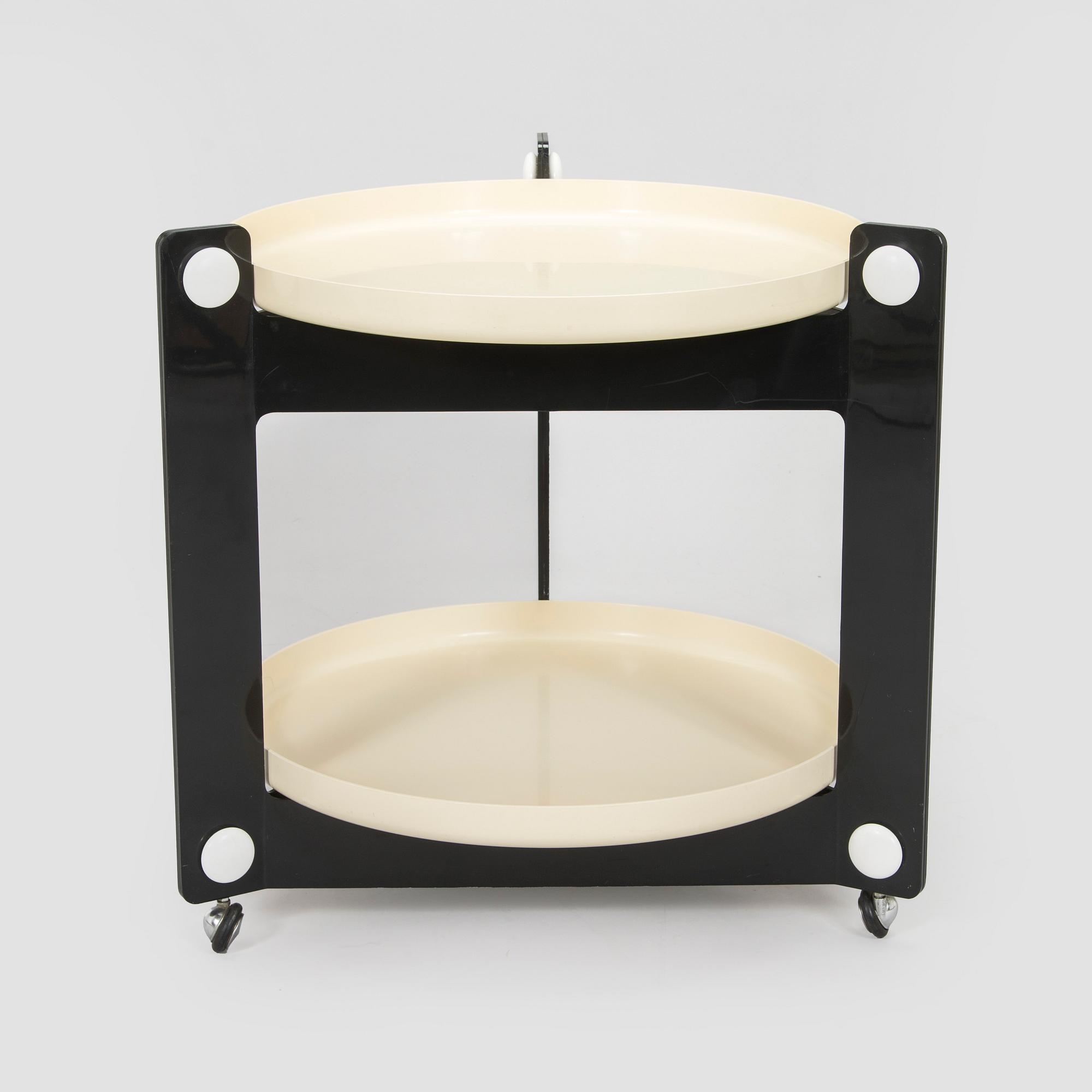 Luigi Massoni, a 1970s table / tray table, for Guzzini, Italy.