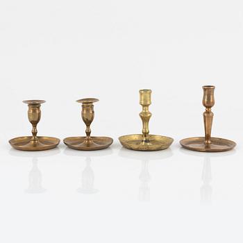 Four bronze candlesticks, a pair of which Skultuna model N 60, 18th-19th Century.