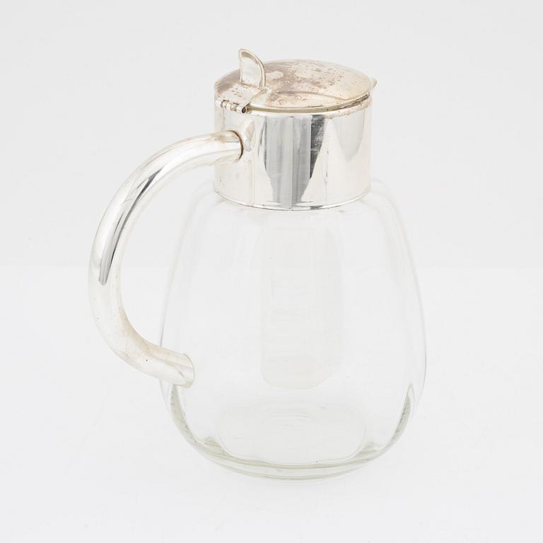 A glass and metal lemonade carafe / cocktail decanter, 20th century.