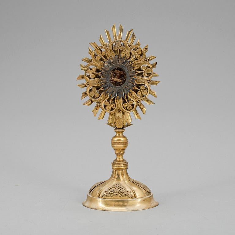 MONSTRANS förgylld mässing, empire, 1800-talets första hälft.