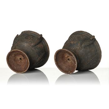 A pair of cast-iron garden urns, presumably from Näfveqvarns styckebruk, dated 1789.