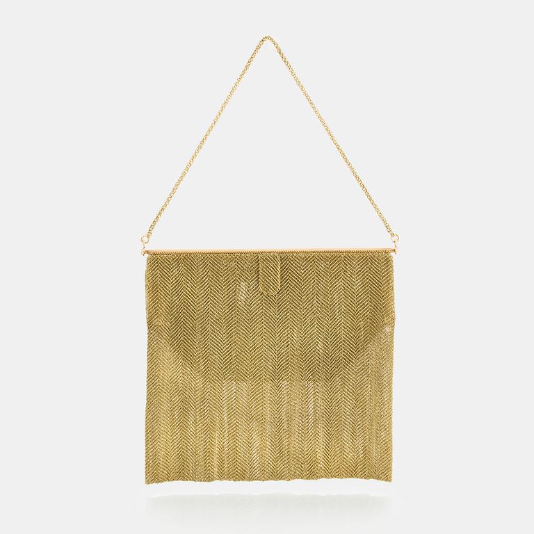 An evening bag in 18K gold.