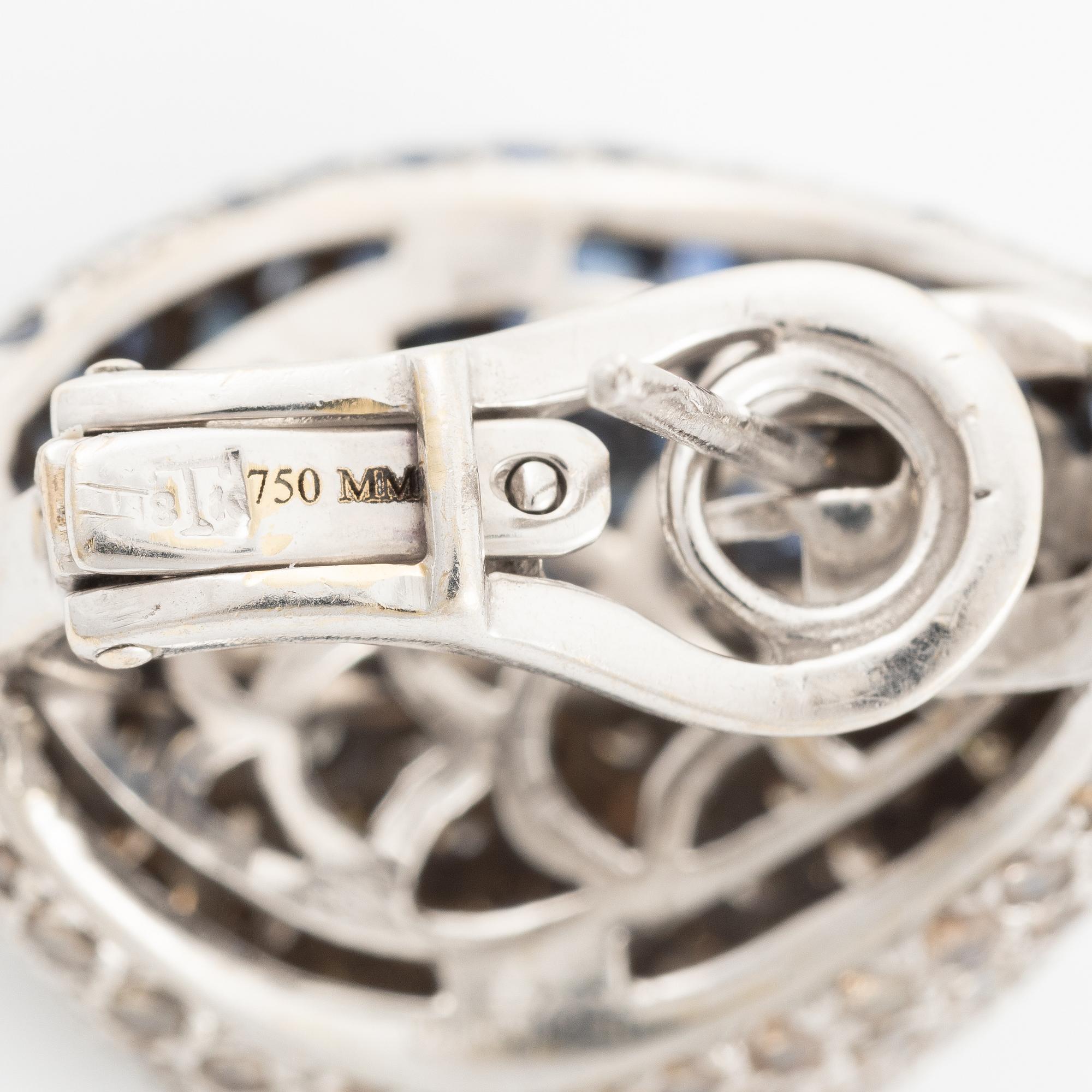 Earrings, a pair, 18K white gold with sapphires and diamonds.
