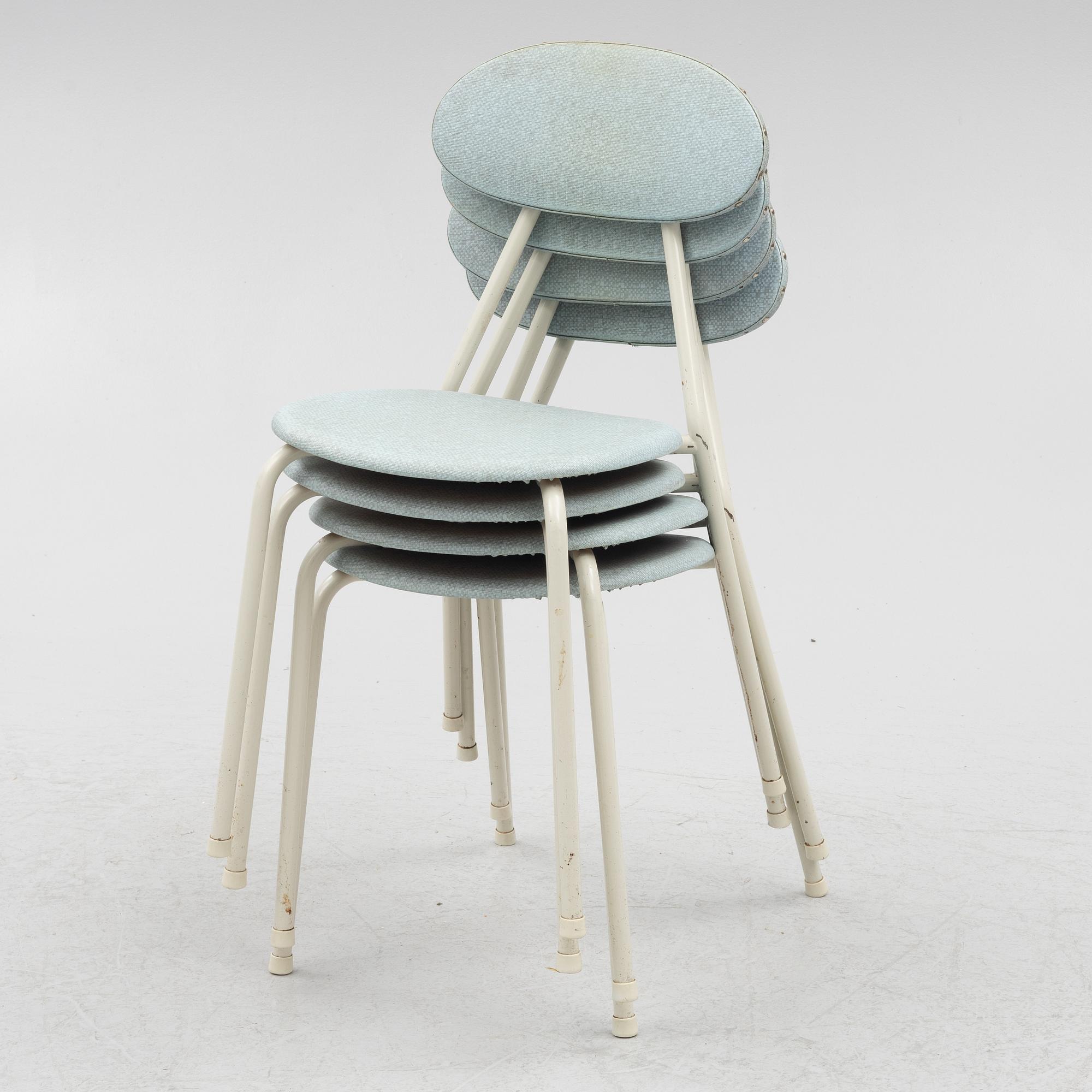 A table and four chairs, mid-20th Century.