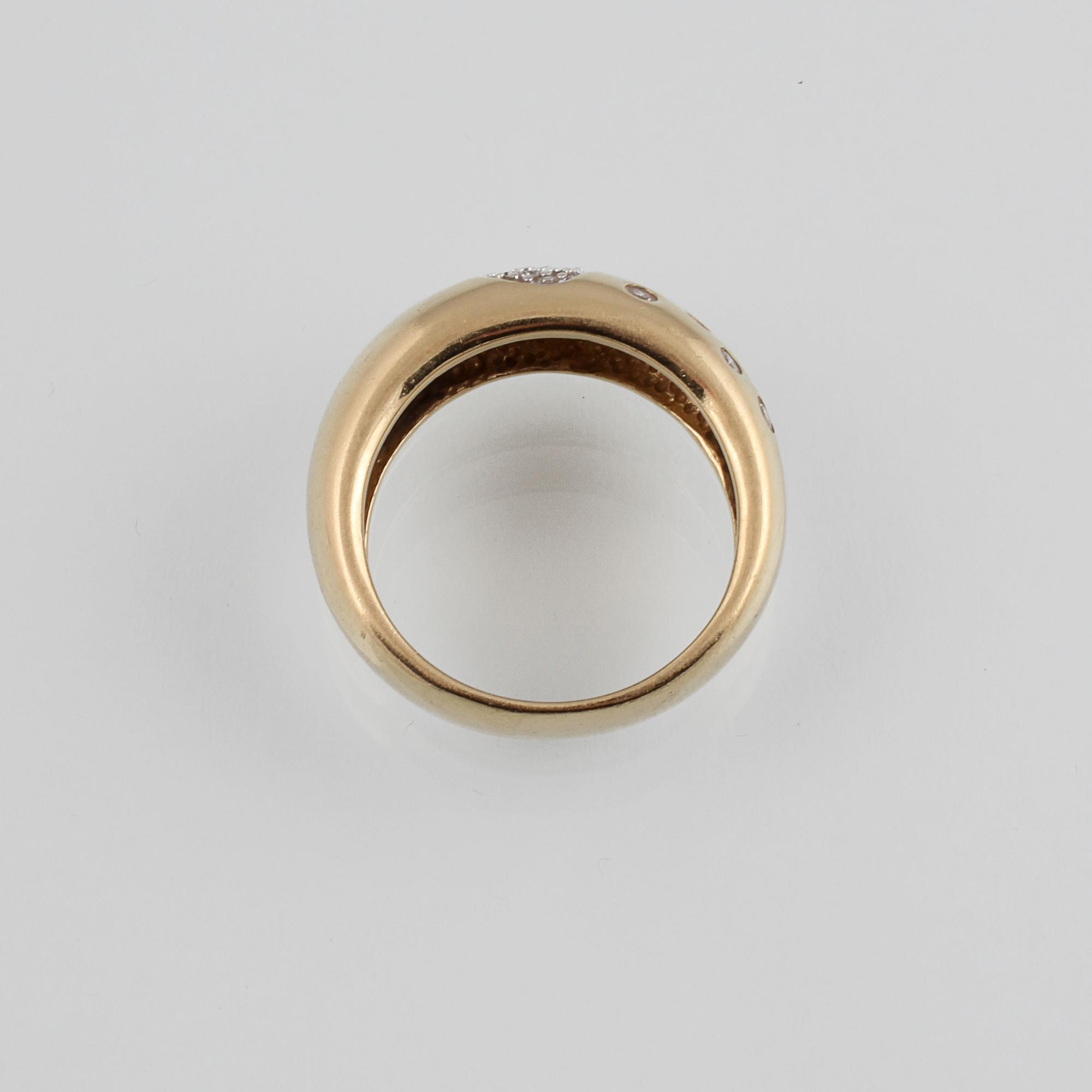 RING, 18K guld med 23 briljantslipade diamanter ca 0.34 ct. Vikt 9,7 gram.