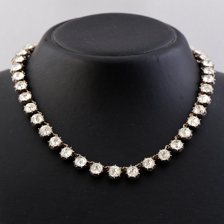 A  RIVIERE NECKLACE, facetted glass, silver, 19th century.
