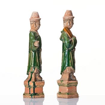 A pair of green glazed sculptures, Ming dynasty (1368-1644).