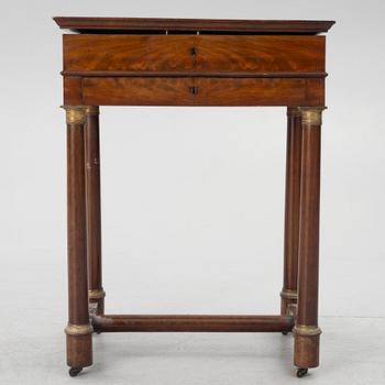 A French Empire mahogany sewing table, first part 19th century.