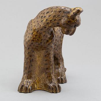 Vicke Lindstrand, a glazed ceramic sculpture of a cheetah, model 3003, Upsala-Ekeby, Sweden ca 1949.