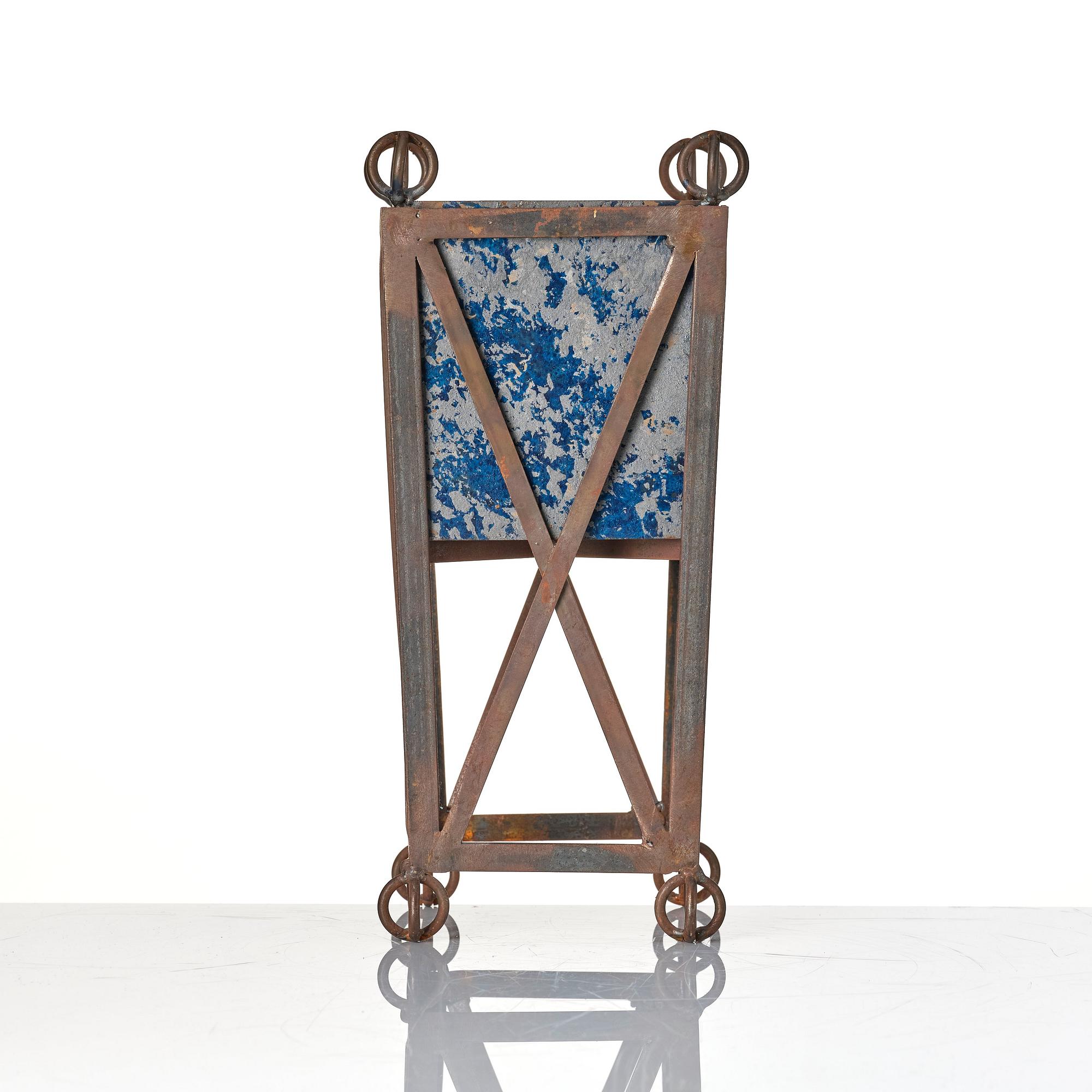 Tage Andersen, a patinated metal flower pot, Denmark, end of 20th century.