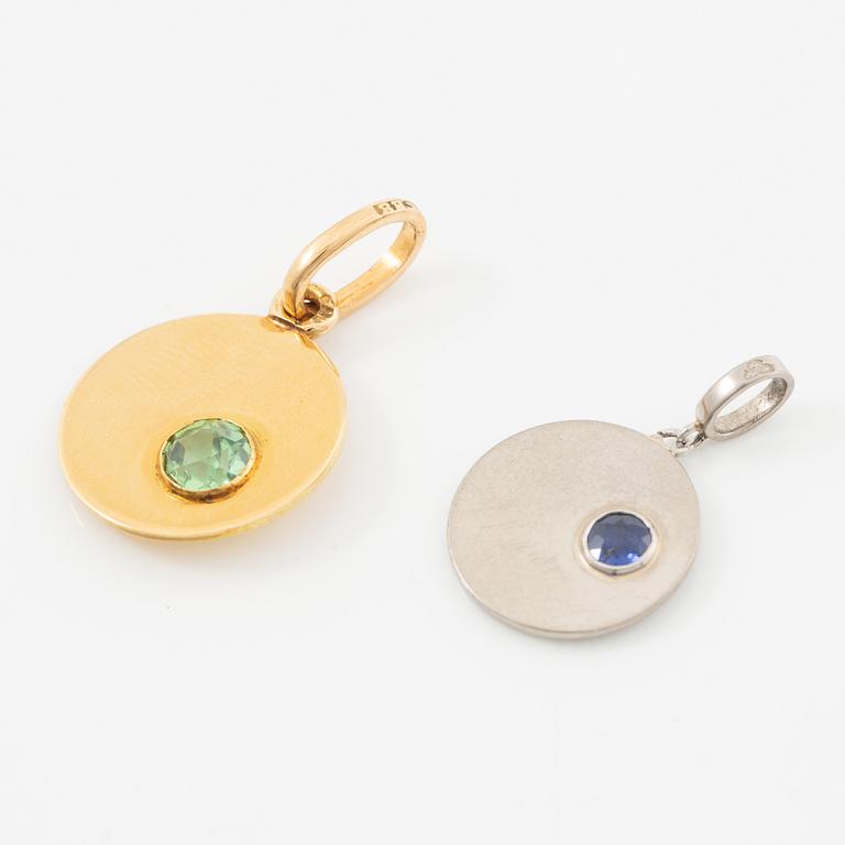 Two pendants in 18K gold and white gold.