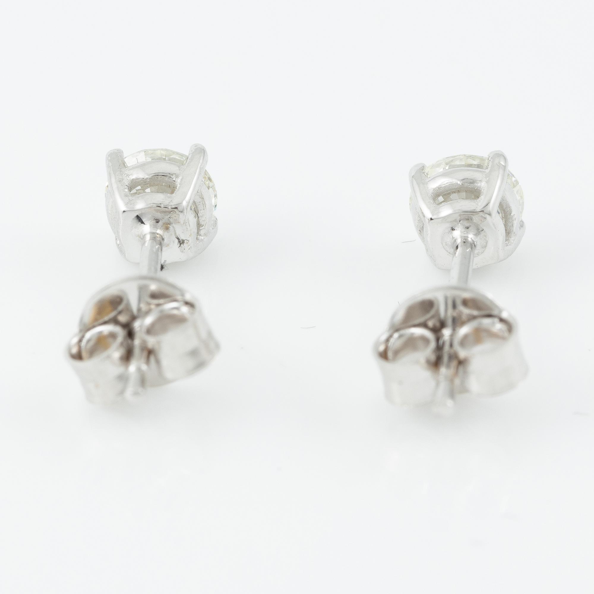 Earrings, a pair, 18K white gold with brilliant-cut diamonds.