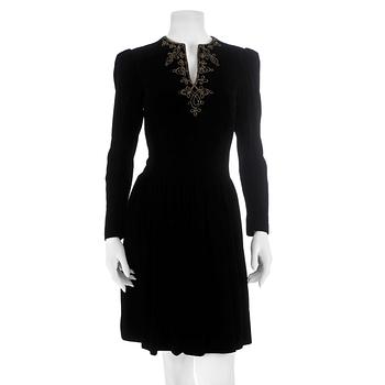 498. OSCAR DE LA RENTA, a black velvet dress with beading.