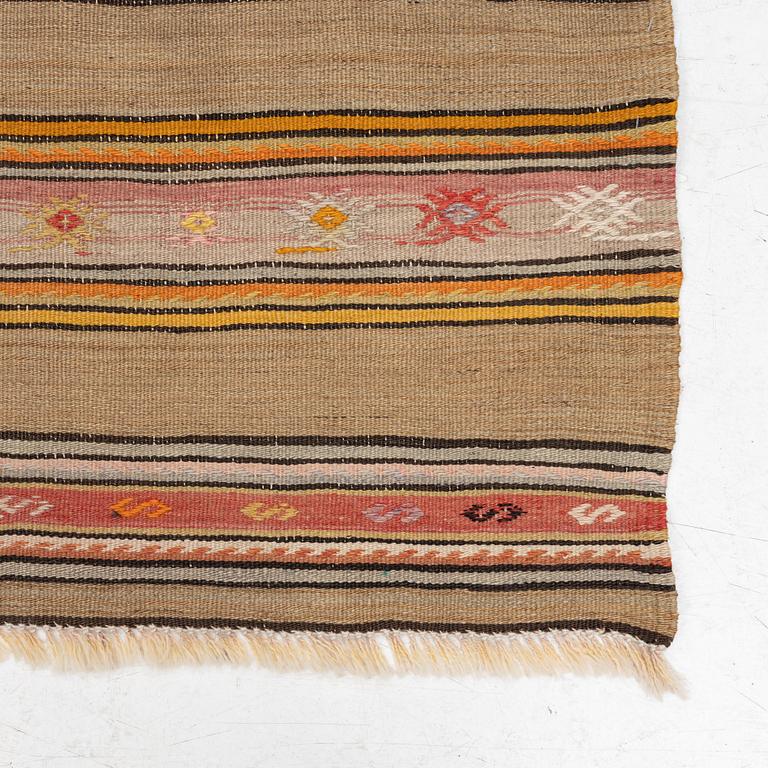 A Kelim rug, c. 250 x 138 cm.