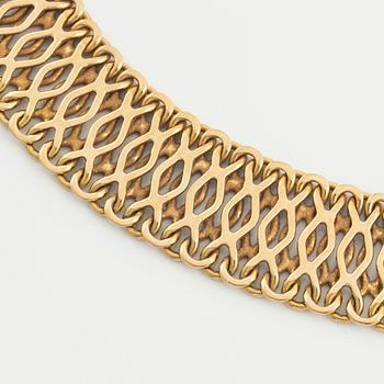 An 18K gold necklace by JE Hellströmer.