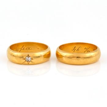 Ringar, 2 styckar, 23K en med en diamant, Johan Hanson, Umeå, 1896 och 1898 respektive. Vikt ca 21,74 g.