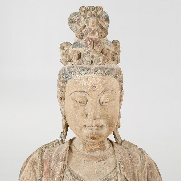 A Chinese 20th century wooden bodhisattva.