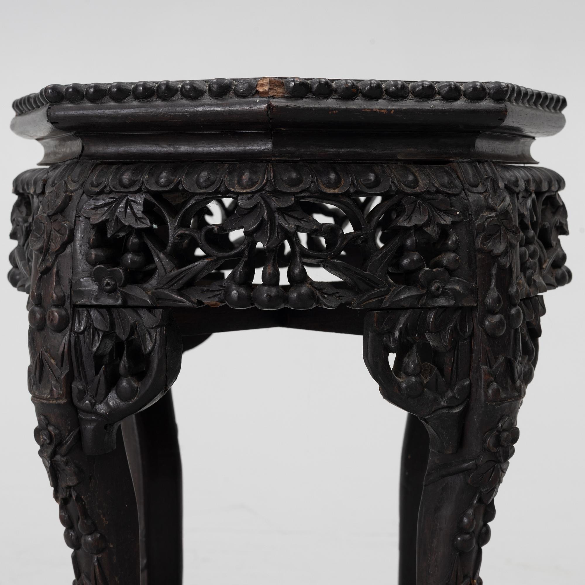 A Chinese small table, carved wood and stone, 1900s.