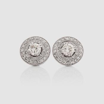 1273. A pair of brilliant-cut diamond earrings. Total carat weight 1.64 cts.