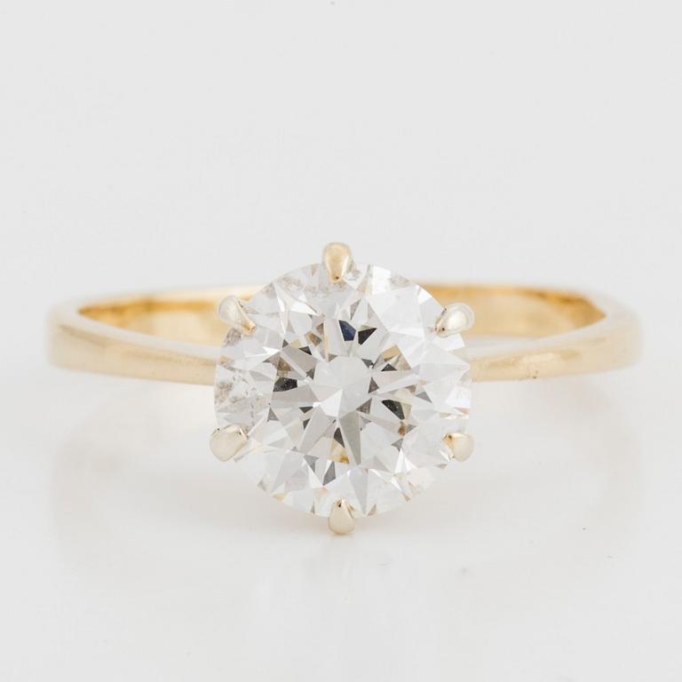 A RING set with a brilliant-cut diamond.