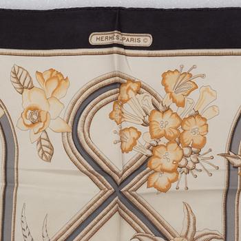 Hermès, a 'Caraibes' silk scarf.