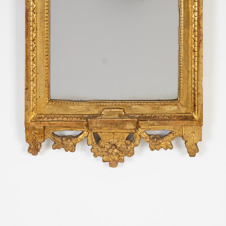 A Gustavian mirror by Johan Åkerblad, master in Stockholm 1758-99), signed.